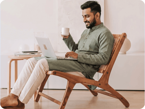 Investor reviewing investments on a laptop at home